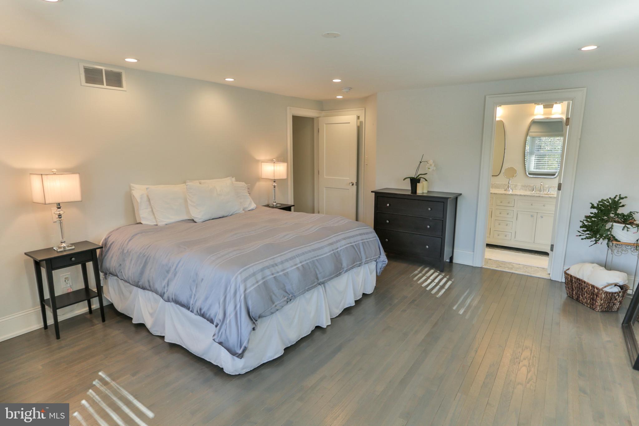 700 Panorama Road Villanova, PA 19085 - Photo 15 of 34 a spacious bedroom with a bed and a dresser