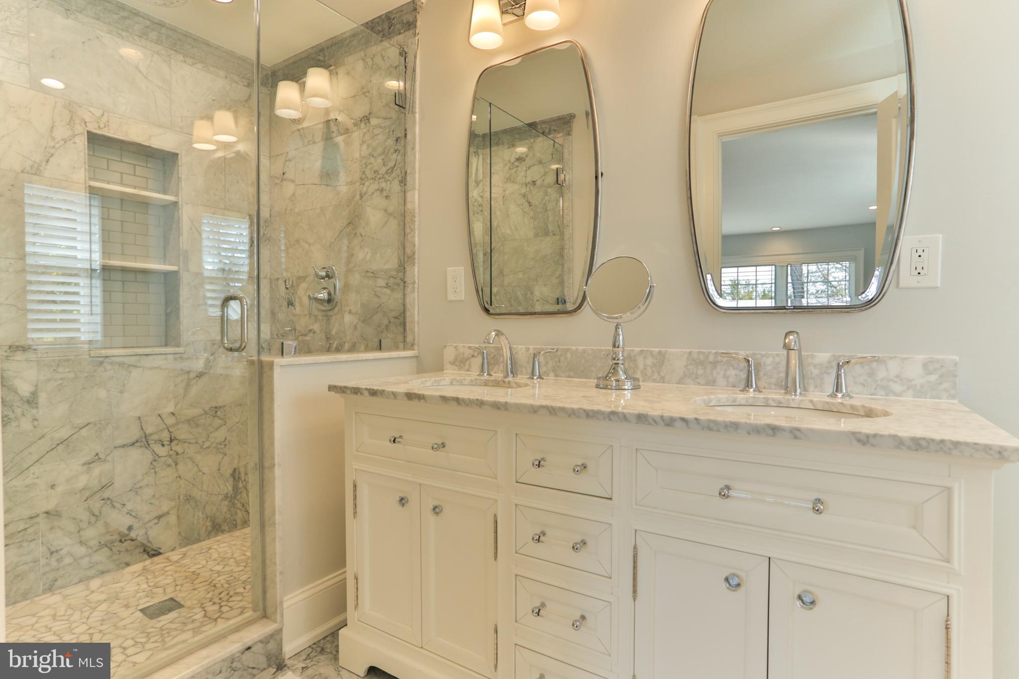700 Panorama Road Villanova, PA 19085 - Photo 16 of 34 a bathroom with double vanity sinks and a shower