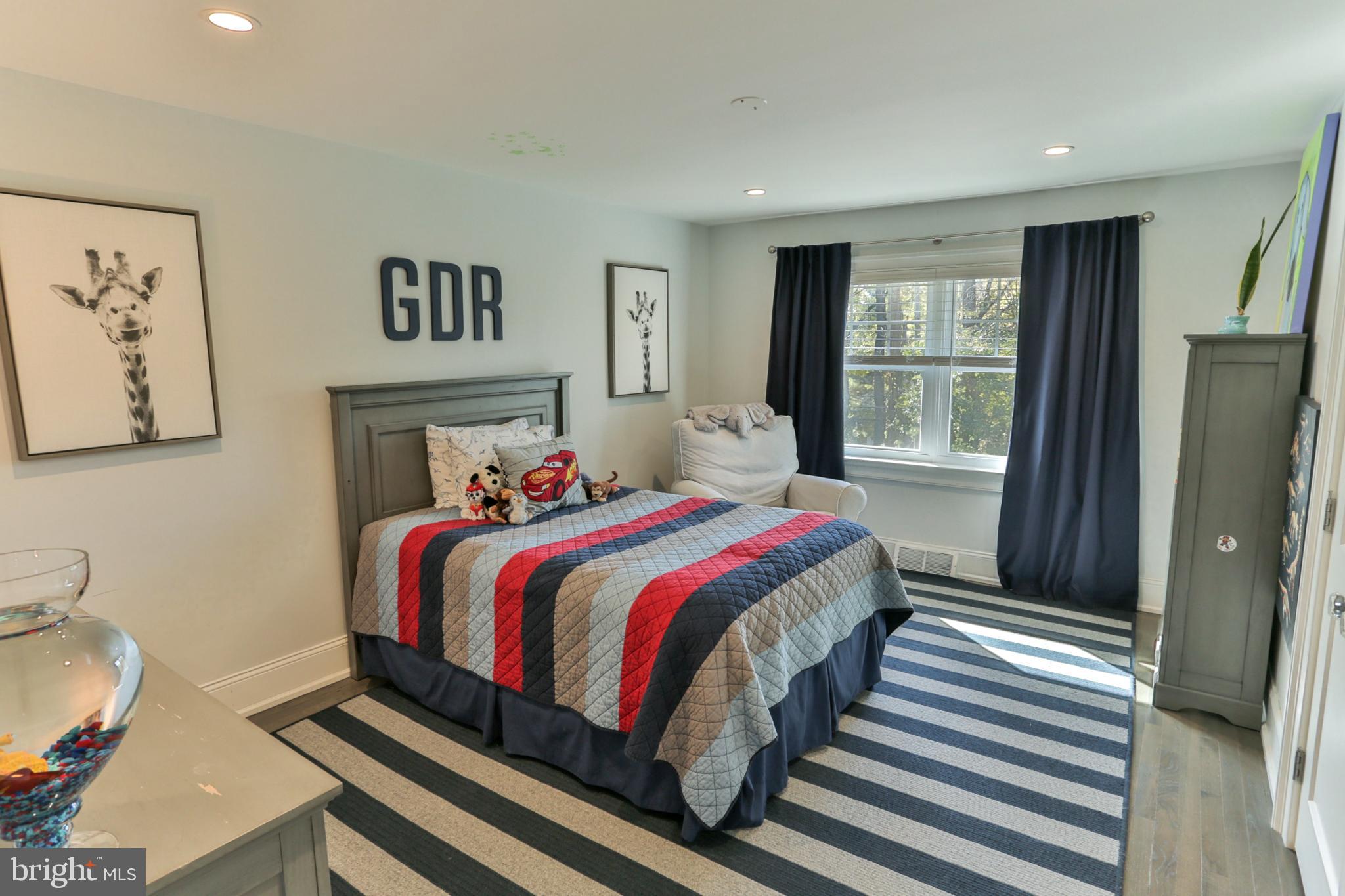 700 Panorama Road Villanova, PA 19085 - Photo 17 of 34 a bedroom with a large bed and a window