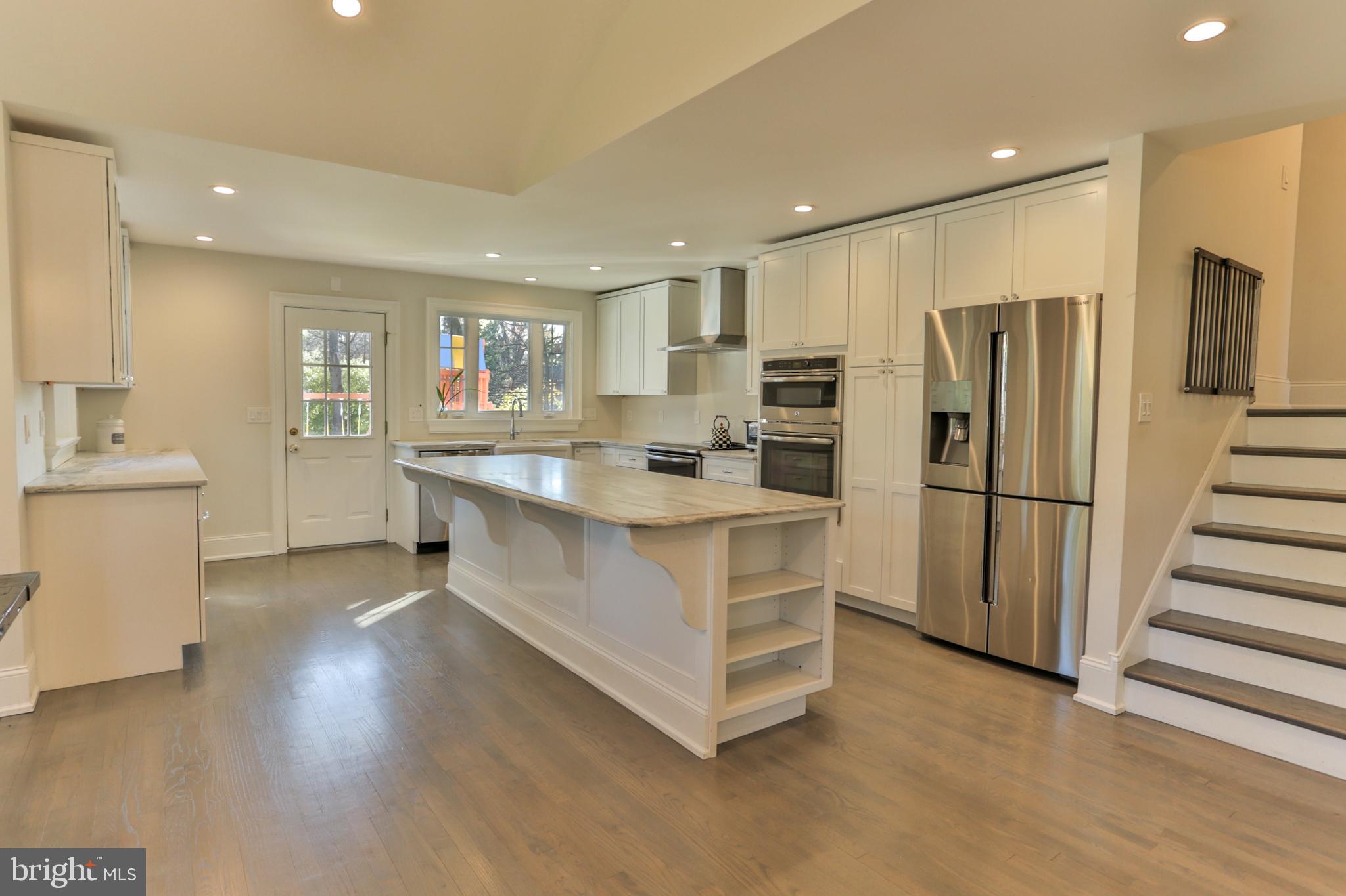 700 Panorama Road Villanova, PA 19085 - Photo 4 of 34 a kitchen with stainless steel appliances a refrigerator sink and cabinets