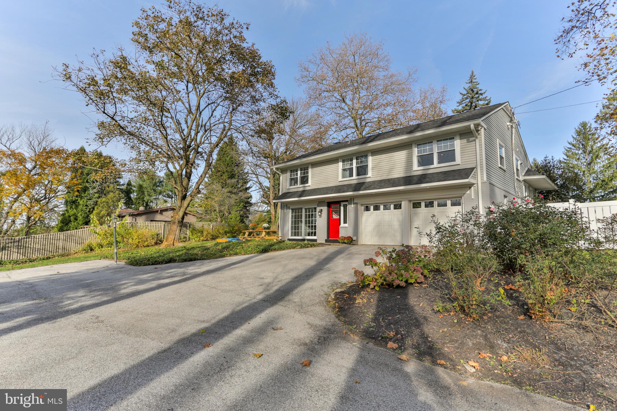 700 Panorama Road Villanova, PA 19085 - Photo 32 of 34 a front view of a house with a yard and garage