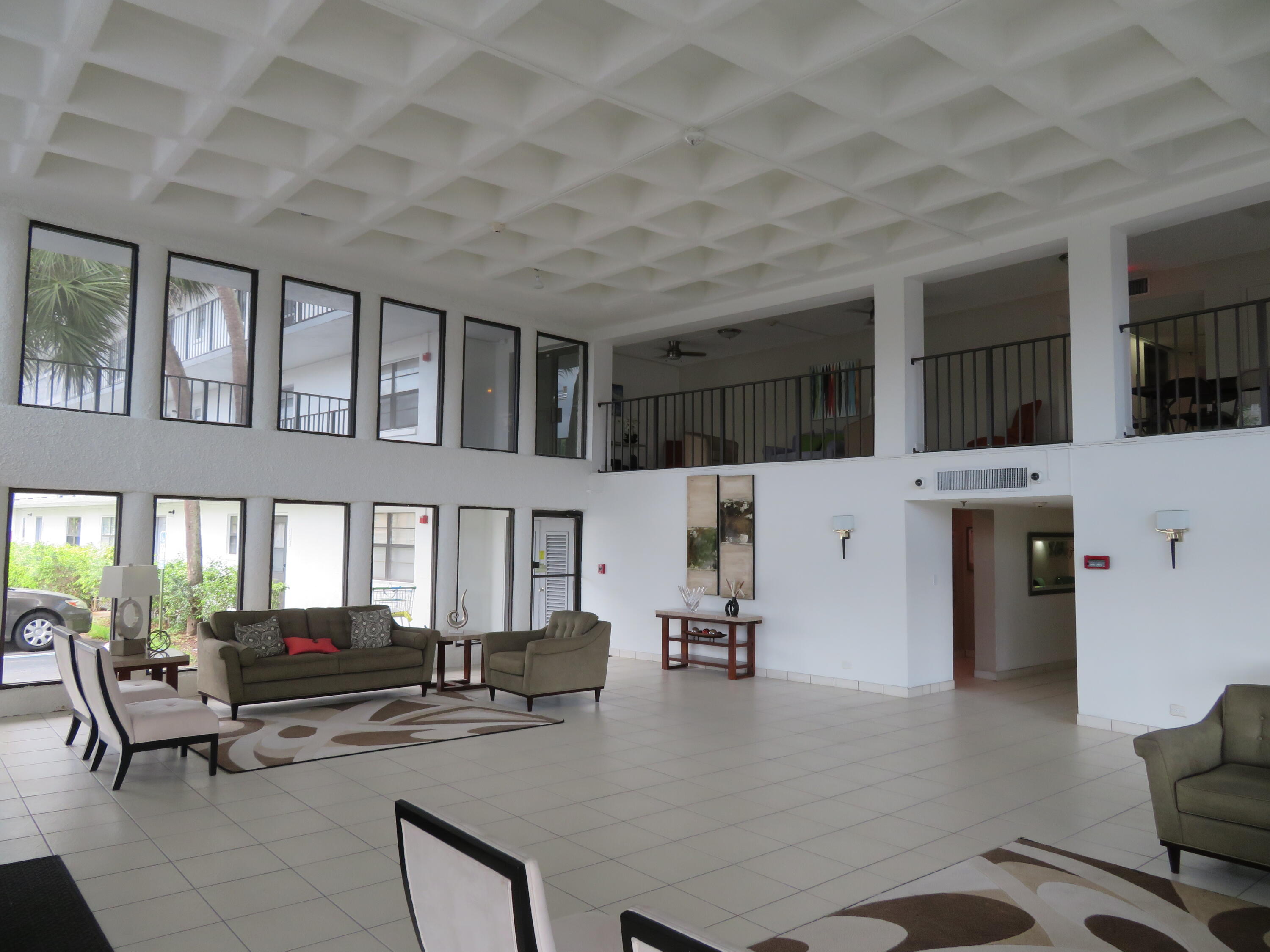 9233 Southwest 8th Street, Unit 122 Boca Raton, FL 33428 - Photo 8 of 38 12_9233_Bldg._Lobby