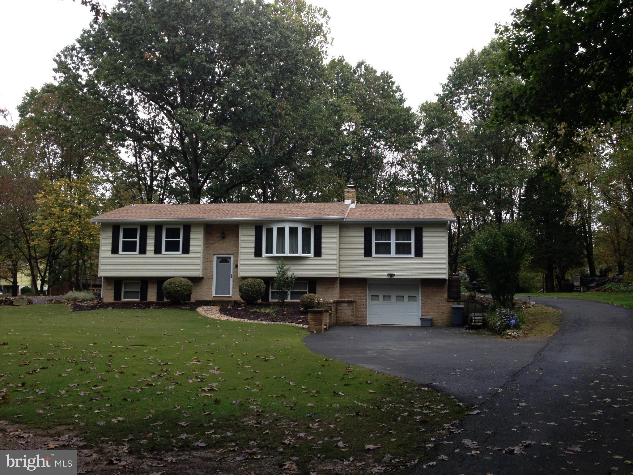 562 Lockhouse Road Falling Waters, WV 25419 - Photo 2 of 29 a view of a house with a yard