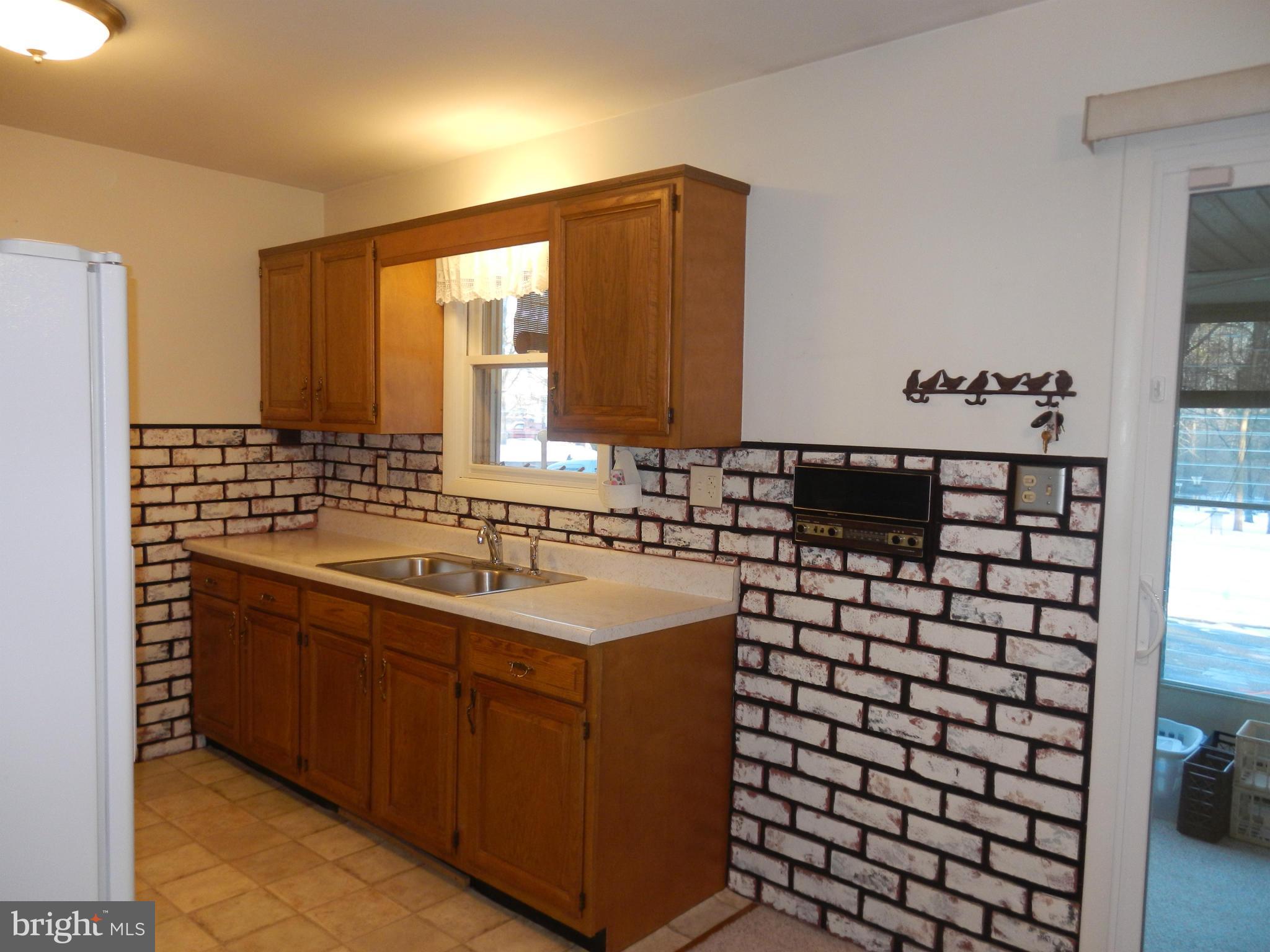562 Lockhouse Road Falling Waters, WV 25419 - Photo 12 of 29 a bathroom with a sink and a mirror