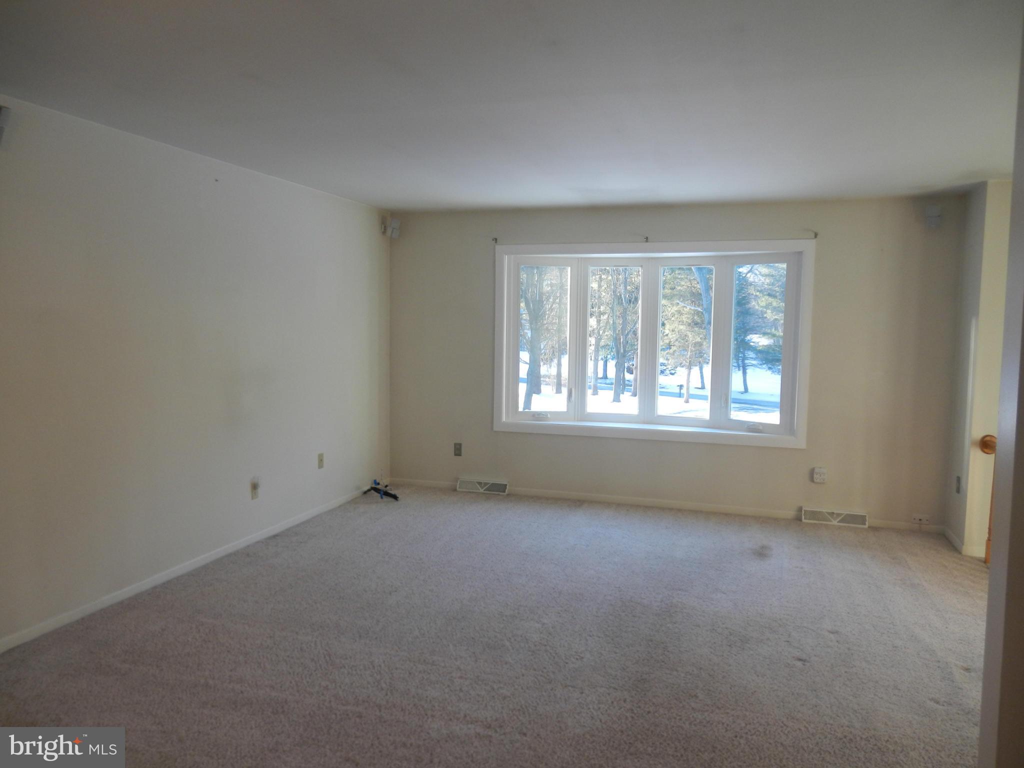 562 Lockhouse Road Falling Waters, WV 25419 - Photo 13 of 29 an empty room with windows