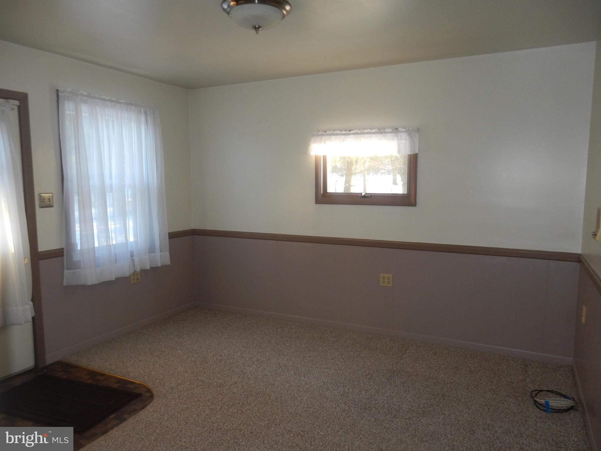 562 Lockhouse Road Falling Waters, WV 25419 - Photo 15 of 29 an empty room with a window