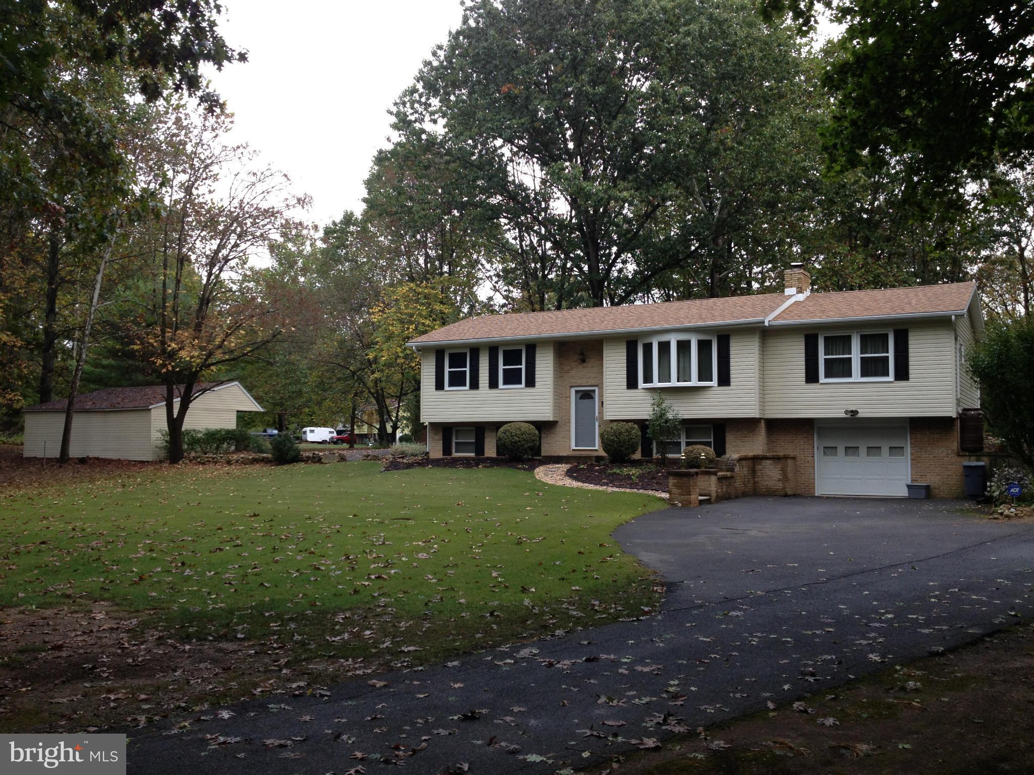 562 Lockhouse Road Falling Waters, WV 25419 - Photo 3 of 29 a view of a house with a yard