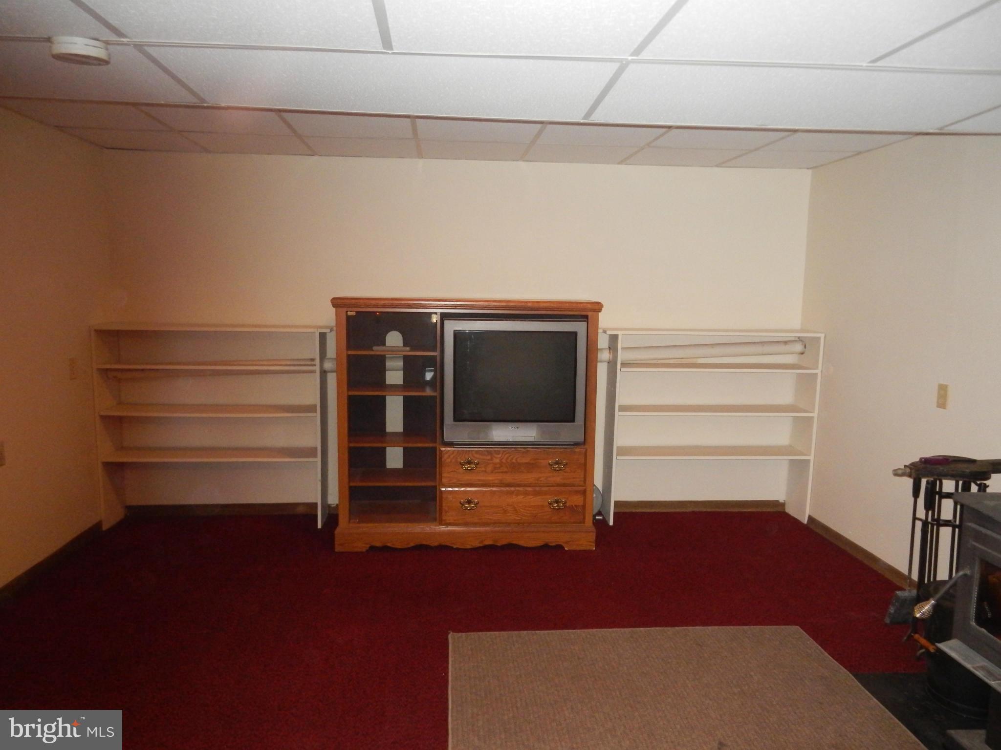 562 Lockhouse Road Falling Waters, WV 25419 - Photo 22 of 29 a view of walk in closet with empty racks