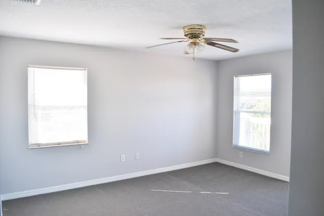 a bathroom with a sink a mirror and shower