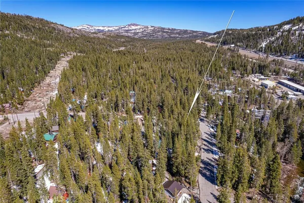 a view of a city with mountains in the background