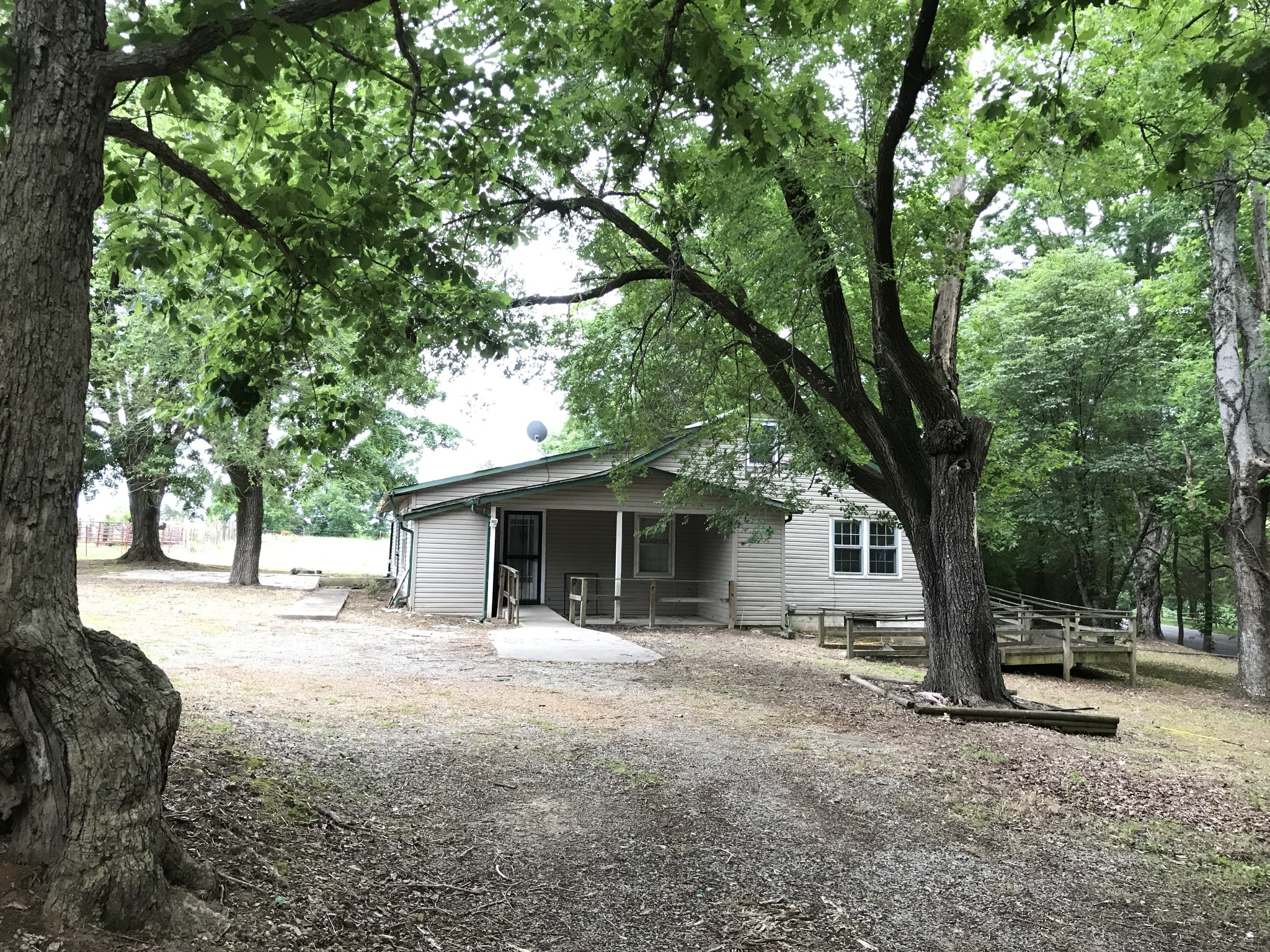 811 Gholson Road Clarksville, TN 37043 - Photo 1 of 25 a view of a house with a tree in front of it