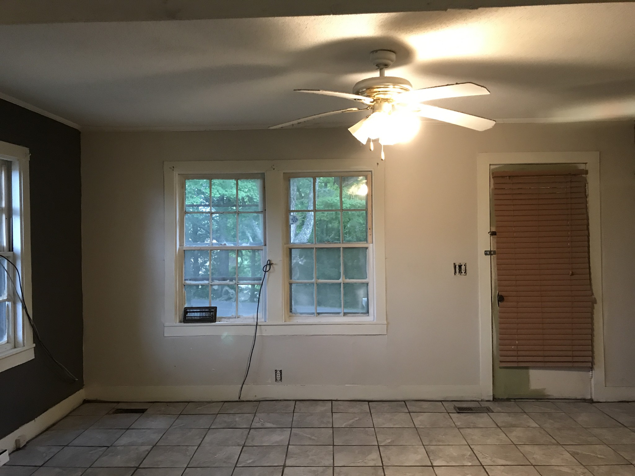 811 Gholson Road Clarksville, TN 37043 - Photo 15 of 25 a room that has a window and a chandelier fan