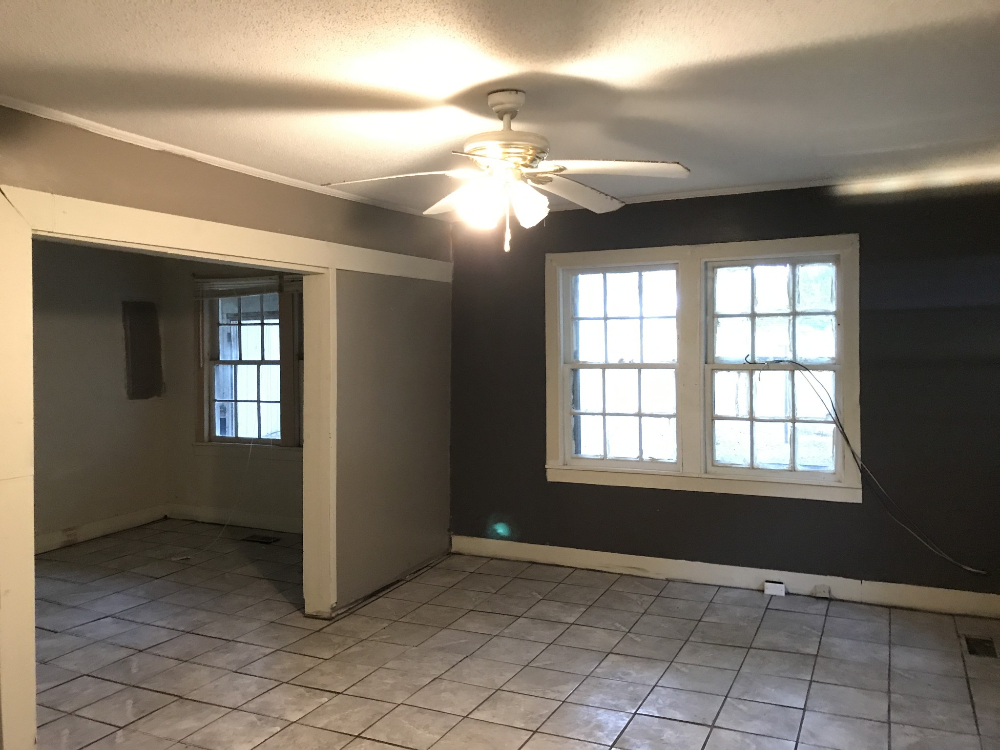 811 Gholson Road Clarksville, TN 37043 - Photo 17 of 25 a view of an empty room with window and chandelier fan