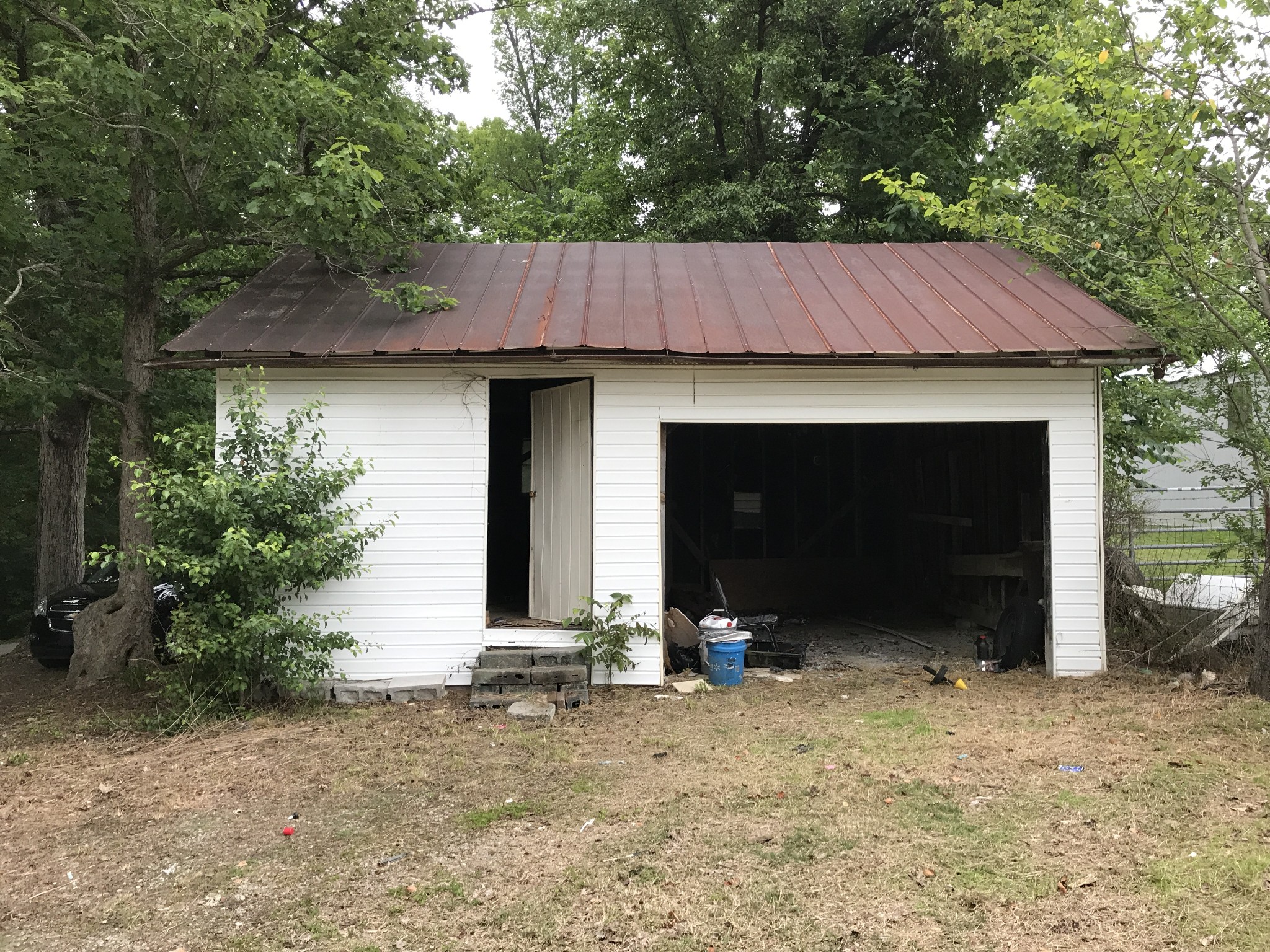811 Gholson Road Clarksville, TN 37043 - Photo 5 of 25 a front view of a house with a yard and garage
