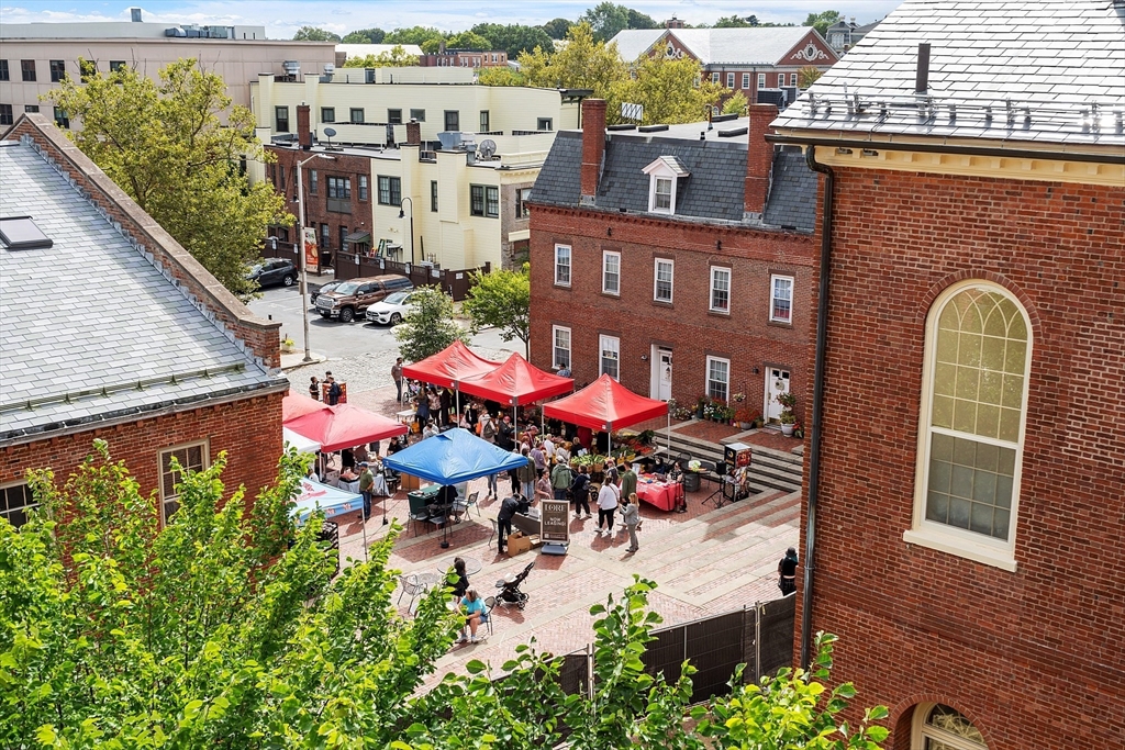 20 Central Street, Unit 402 Salem, MA 01970 - Photo 25 of 36 an aerial view of a house with a swimming pool