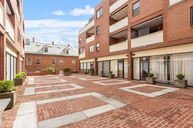 a view of a building with a street