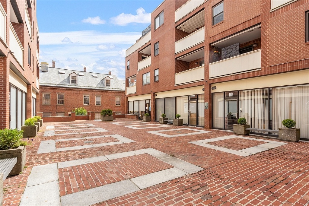 20 Central Street, Unit 402 Salem, MA 01970 - Photo 4 of 36 a view of a building with a street