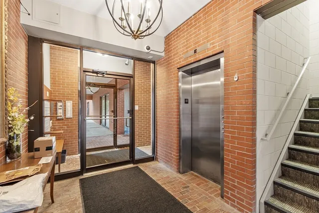 a view of entryway with a front door