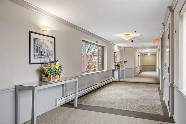 a view of an entryway with a workspace