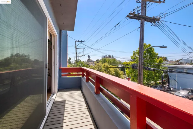 a view of balcony with a potted plant