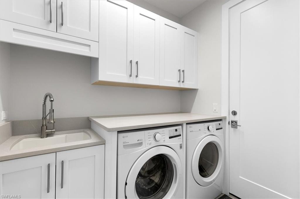734 109th Avenue North Naples, FL 34108 - Photo 33 of 34 a utility room with dryer and washer