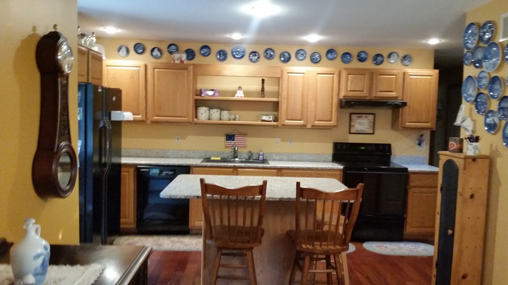 351 Quaddick Road Thompson, CT 06277 - Photo 17 of 28 a kitchen with stainless steel appliances granite countertop a sink and a refrigerator