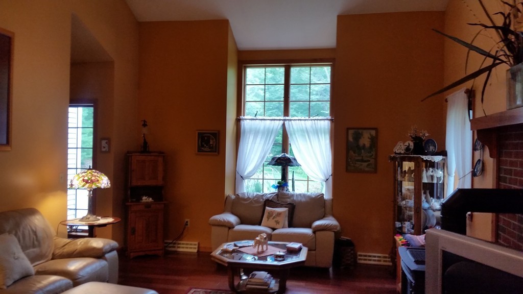 351 Quaddick Road Thompson, CT 06277 - Photo 21 of 28 a living room with furniture and a large window