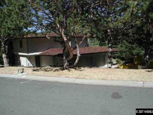 2760 West Lakeridge Reno, NV 89509 - Photo 1 of 1 a house with trees in the background