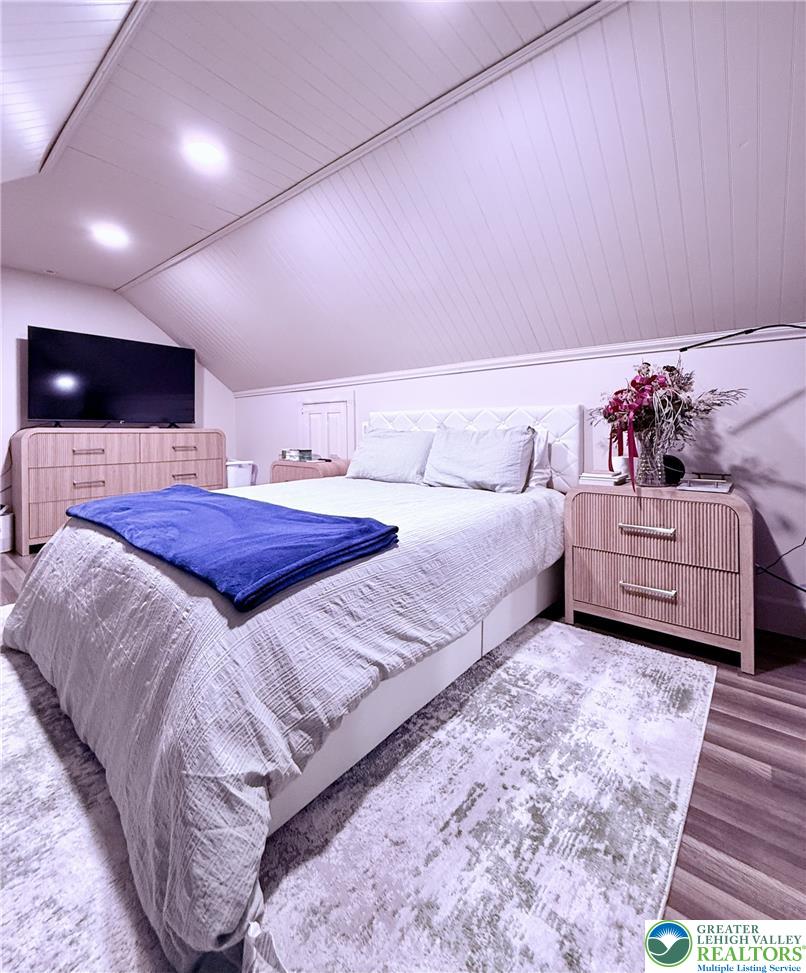 1275 Macada Road Bethlehem, PA 18017 - Photo 61 of 87 a bedroom with double bed and a flat screen tv