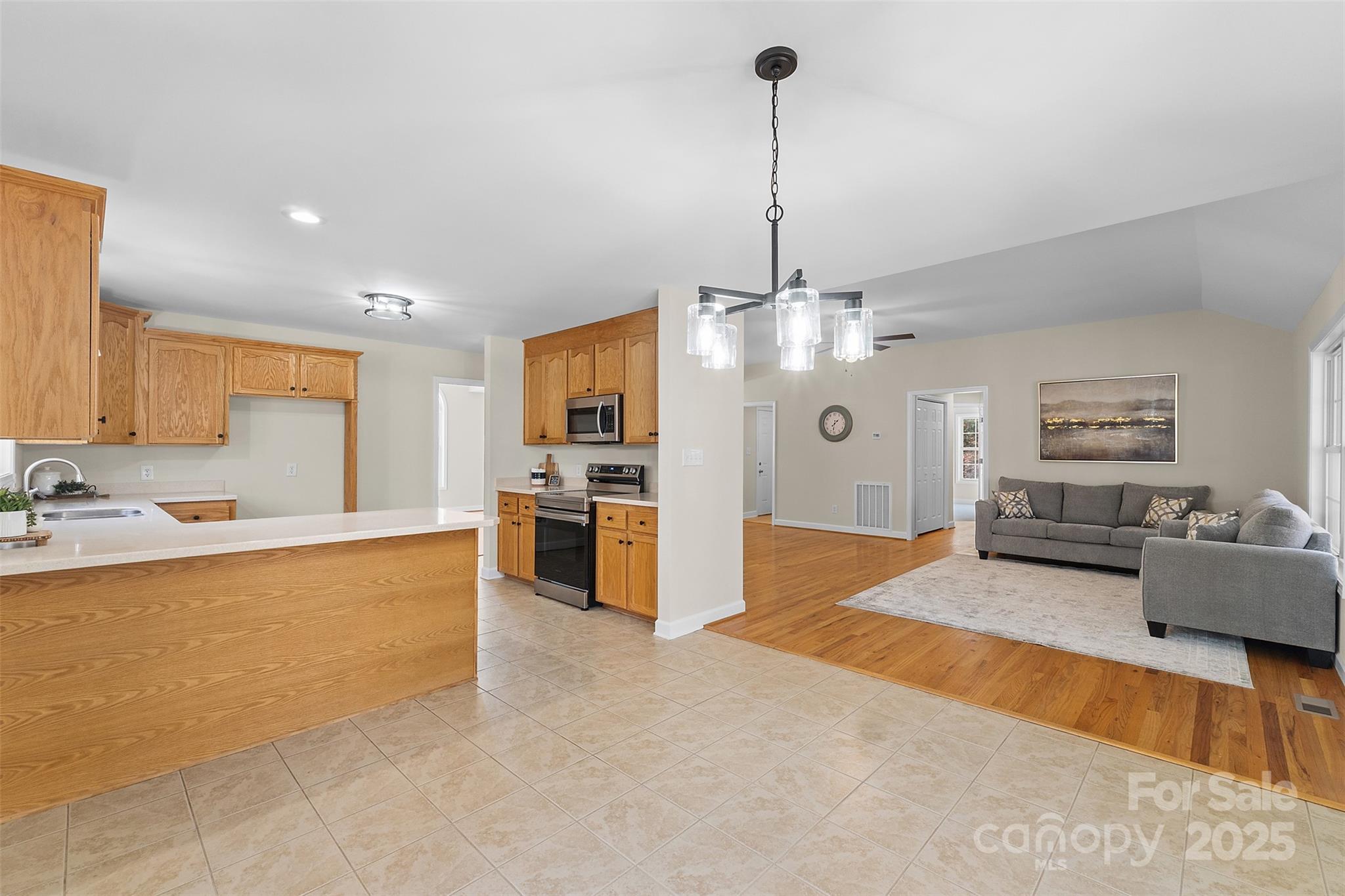490 Rutledge Drive Catawba, SC 29704 - Photo 12 of 33 a large living room with stainless steel appliances granite countertop furniture and a view of living room