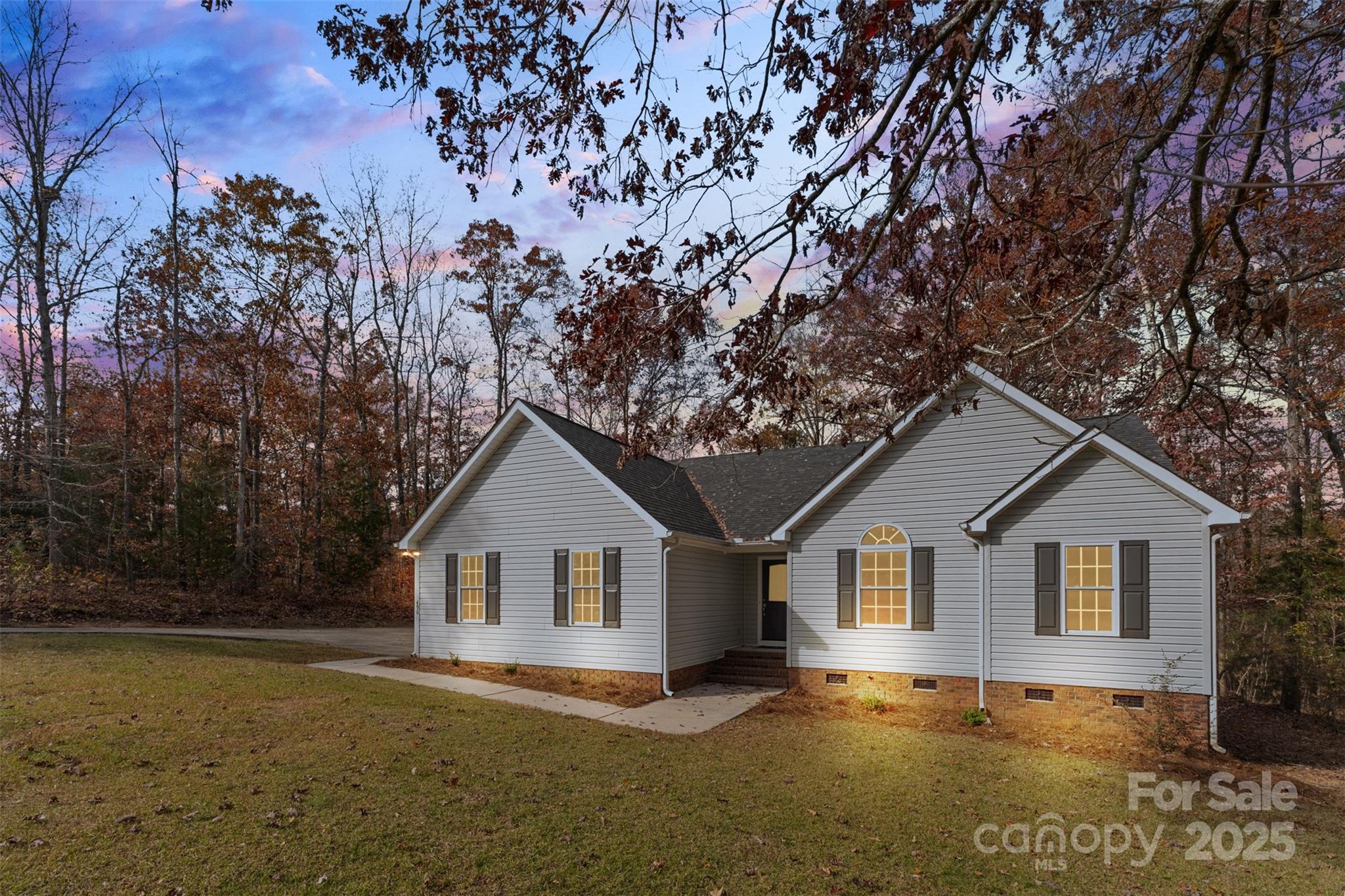 490 Rutledge Drive Catawba, SC 29704 - Photo 2 of 33 a front view of a house with a yard and garage