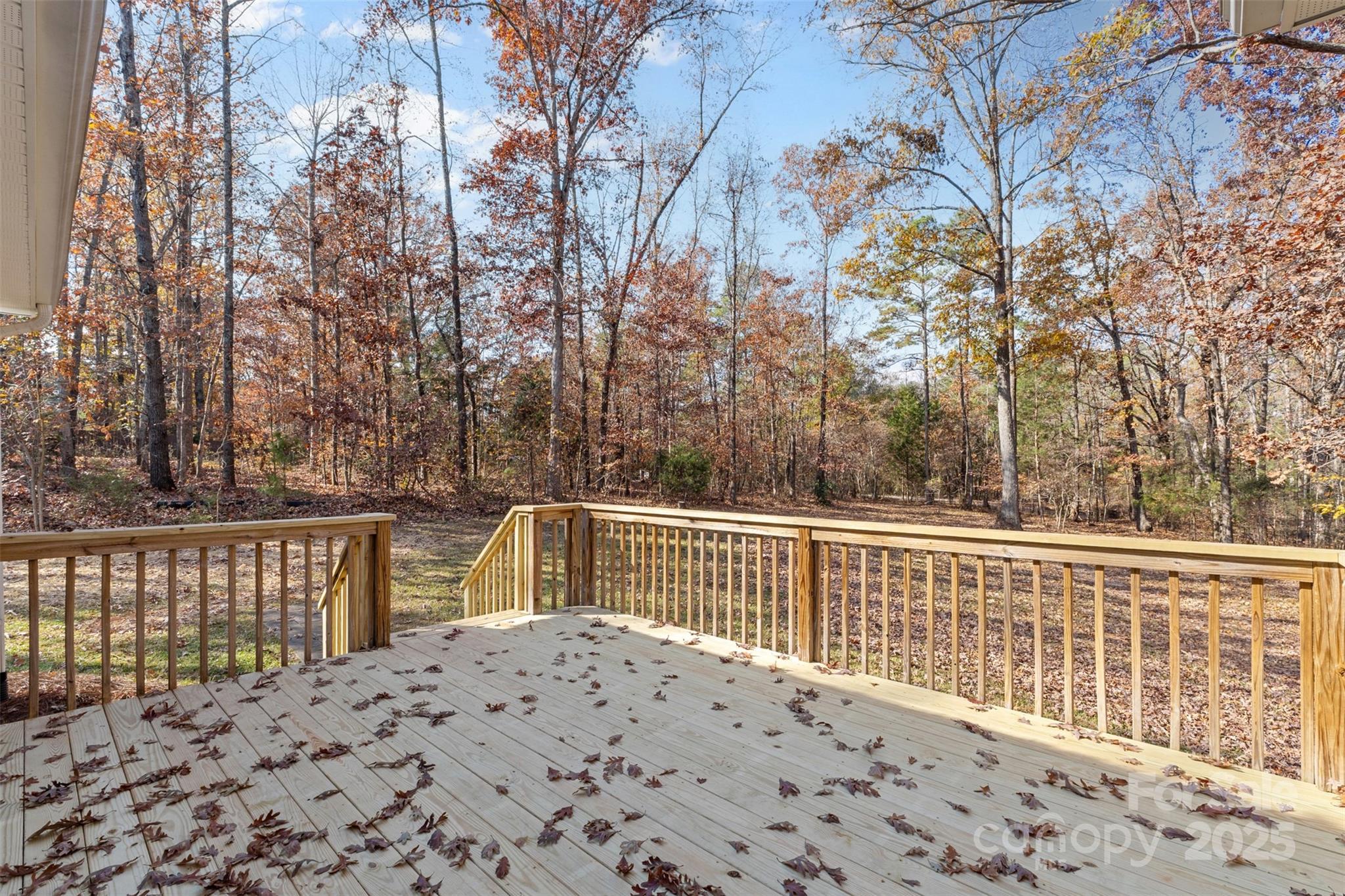 490 Rutledge Drive Catawba, SC 29704 - Photo 28 of 33 a view of a roof deck with wooden fence and floor