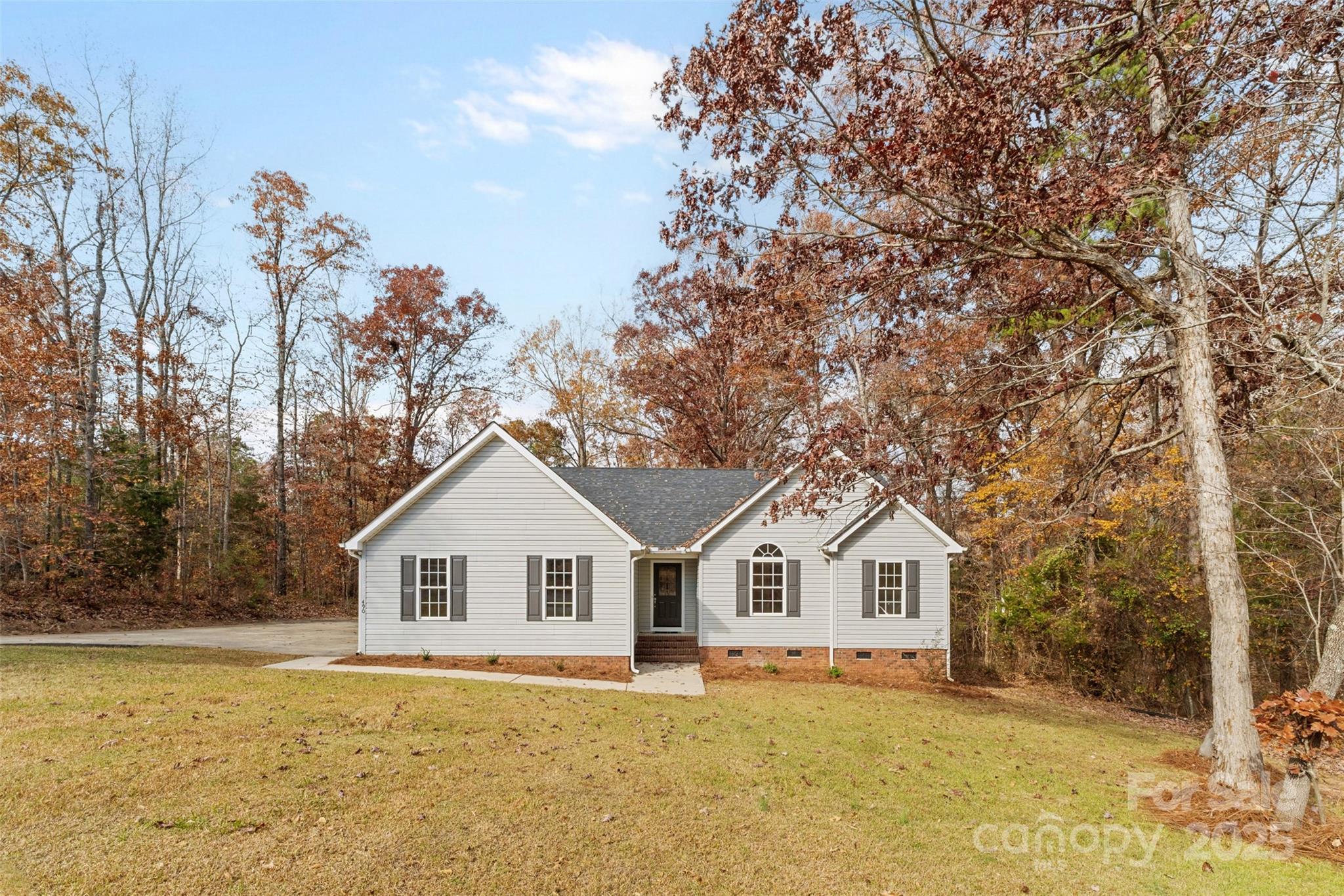 490 Rutledge Drive Catawba, SC 29704 - Photo 3 of 33 a house with trees in the background