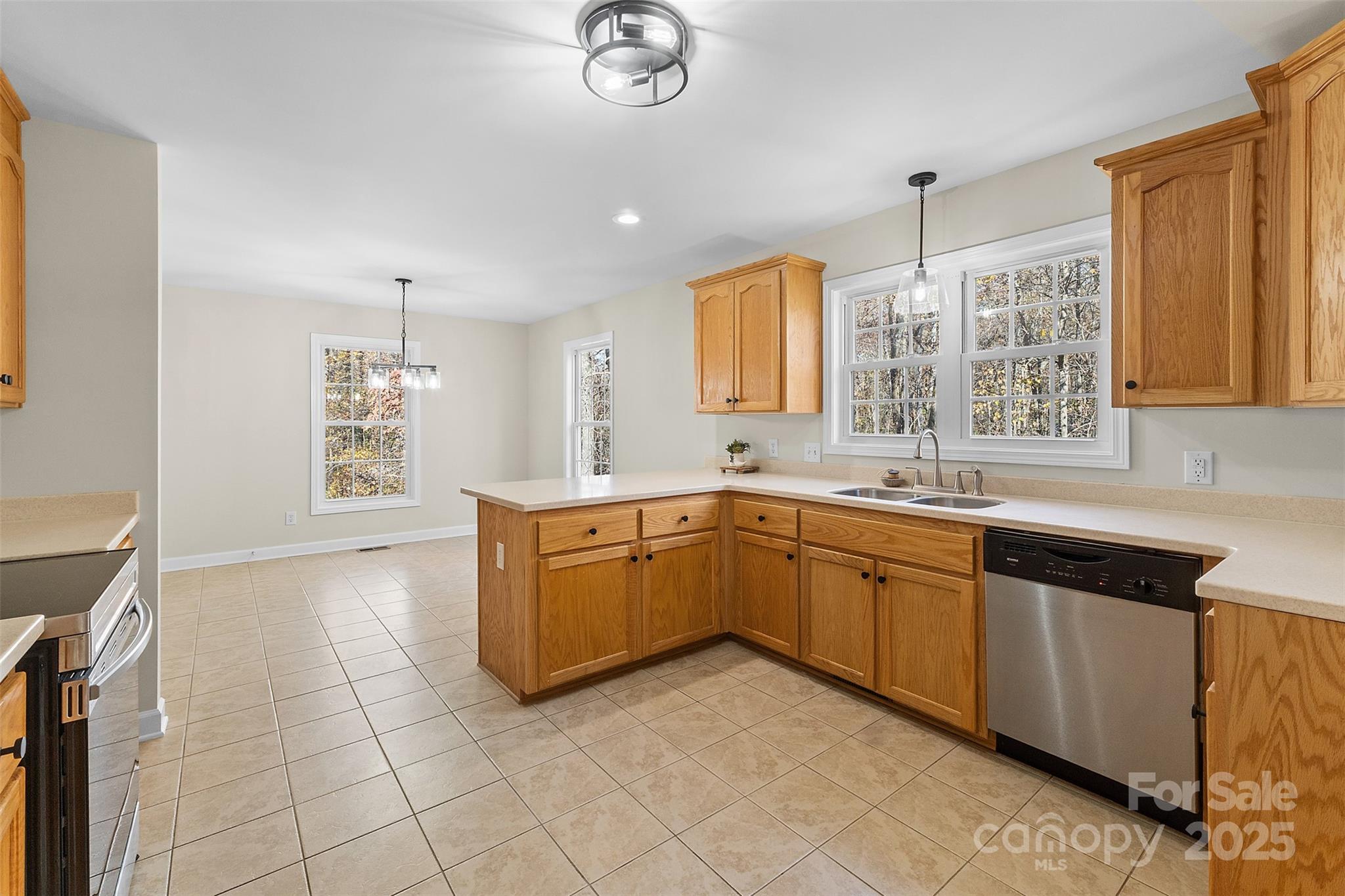 490 Rutledge Drive Catawba, SC 29704 - Photo 8 of 33 a kitchen with stainless steel appliances granite countertop a sink and a stove