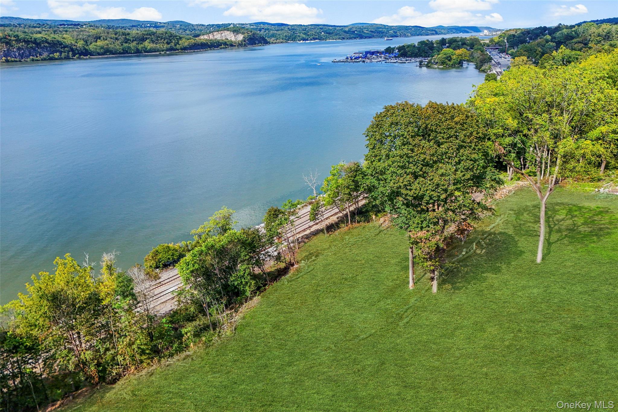 Wheeler Hill Road Wappingers Falls, NY 12590 - Photo 28 of 29 a view of a lake with houses in the back