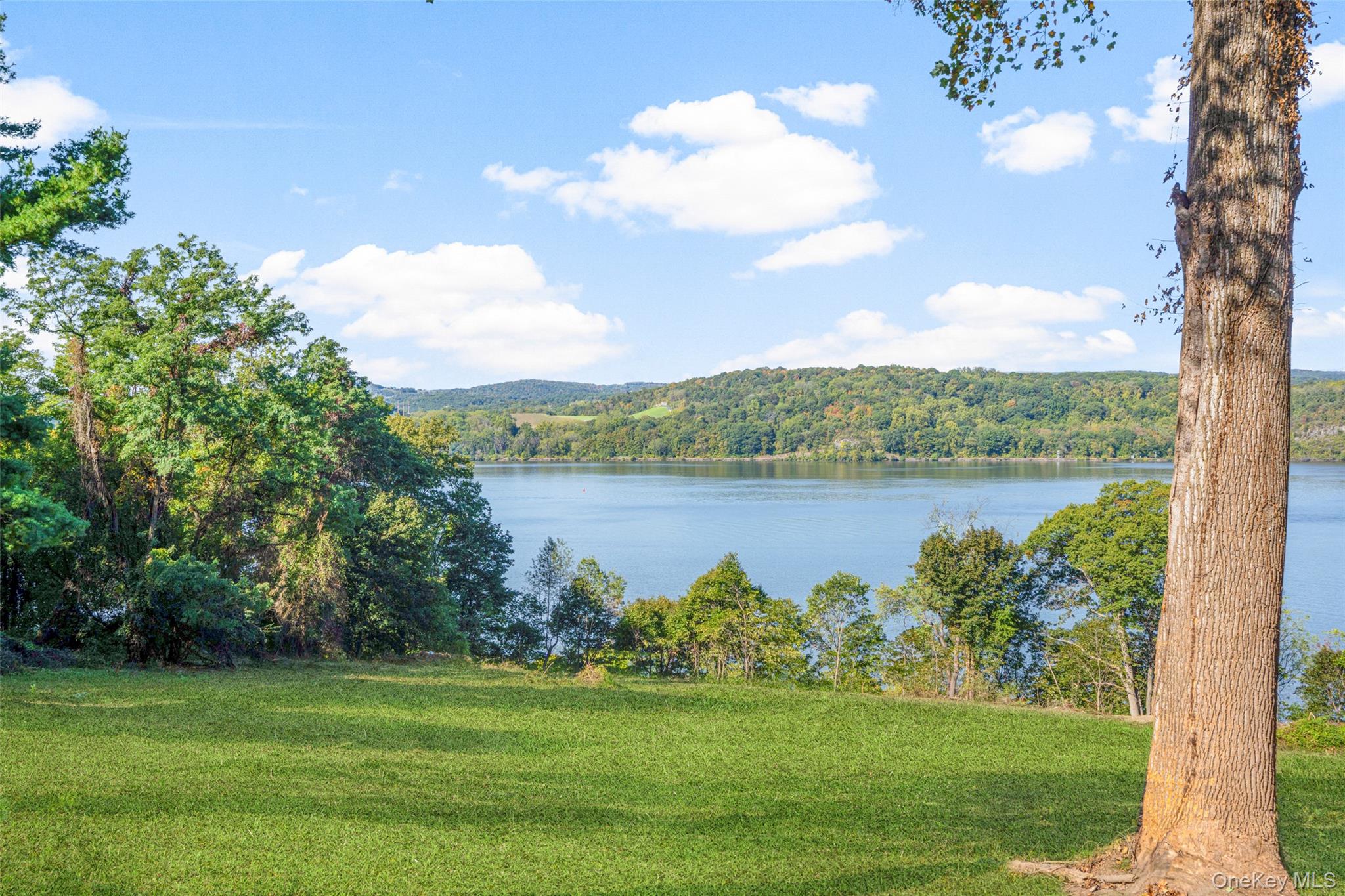 Wheeler Hill Road Wappingers Falls, NY 12590 - Photo 4 of 29 a view of a lake with a big yard