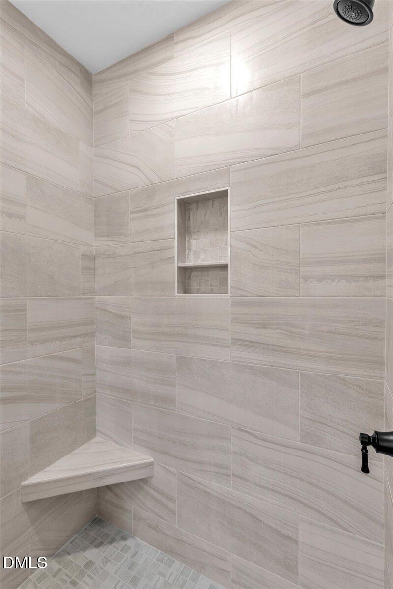 12615 Mallard Rock Drive Zebulon, NC 27597 - Photo 42 of 89 a bathroom with a toilet and a shower