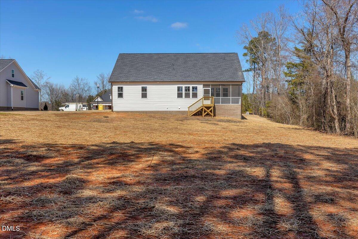 12615 Mallard Rock Drive Zebulon, NC 27597 - Photo 78 of 89 a view of a house with a yard