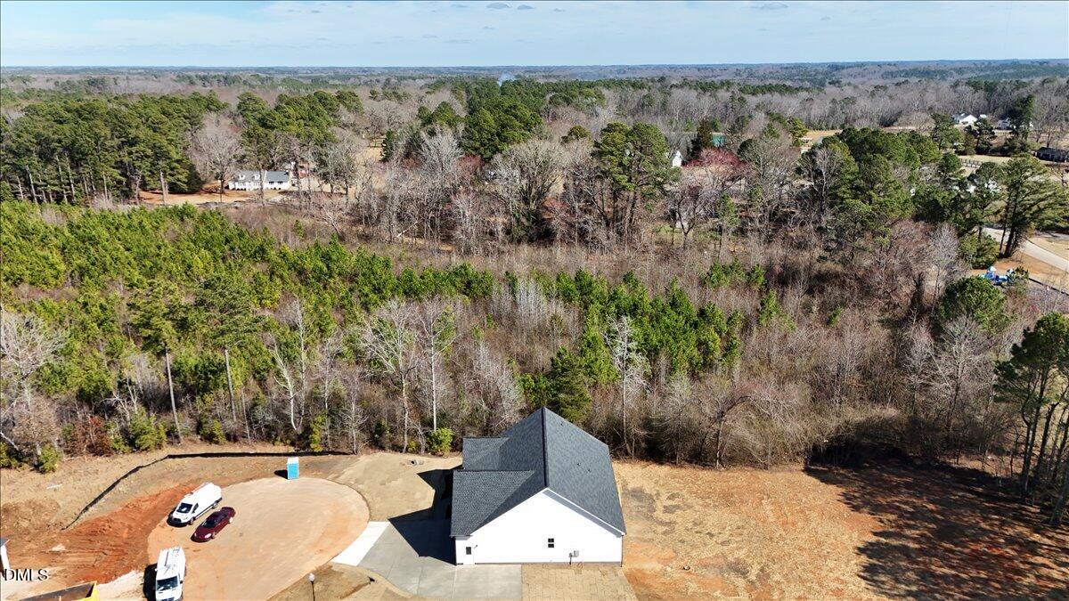 12615 Mallard Rock Drive Zebulon, NC 27597 - Photo 89 of 89 a view of a yard with wooden fence