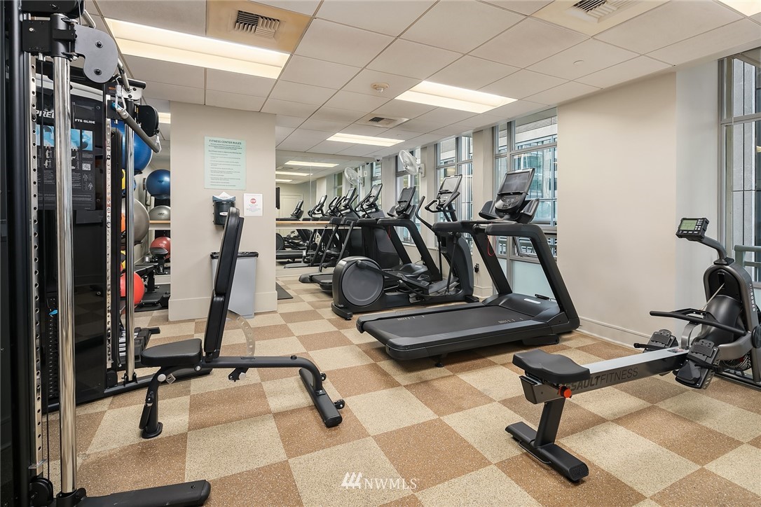 819 Virginia Street, Unit 1006 Seattle, WA 98101 - Photo 13 of 20 a view of a room with gym equipment