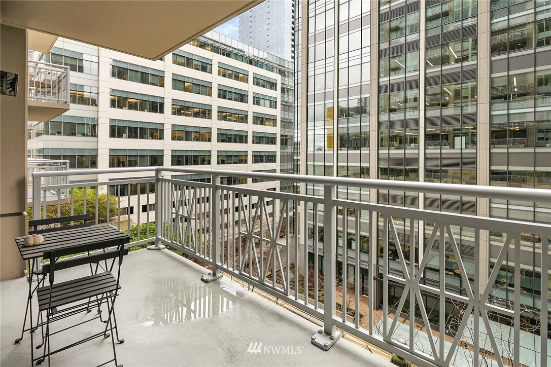 819 Virginia Street, Unit 1006 Seattle, WA 98101 - Photo 8 of 20 a view of a balcony with a floor to ceiling window