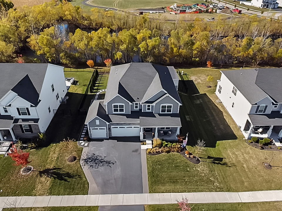 16230 Lake View Road Plainfield, IL 60586 - Photo 3 of 62 an aerial view of a house with a garden