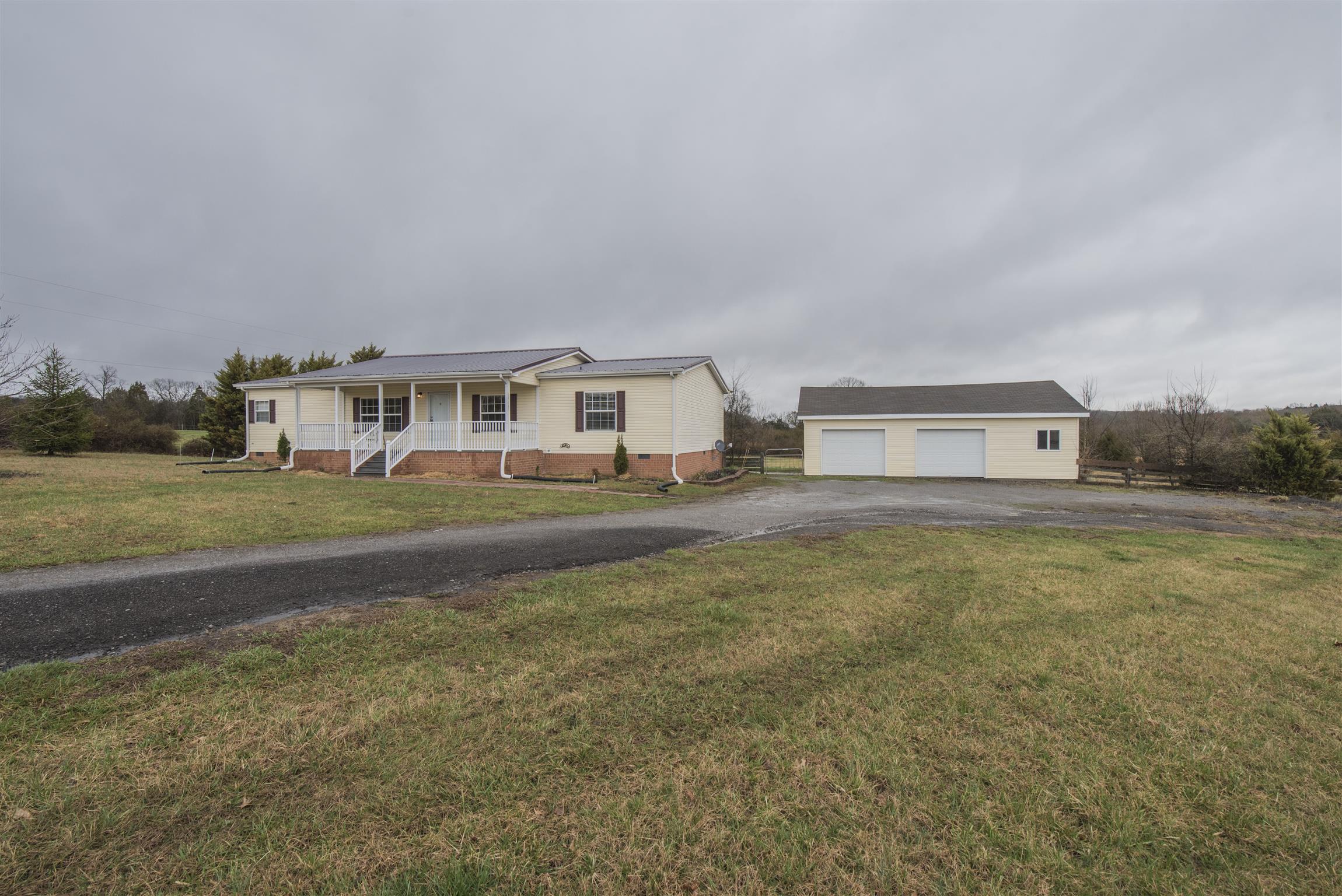 1227 Linwood Road Watertown, TN 37184 - Photo 1 of 29 a front view of a house with a yard