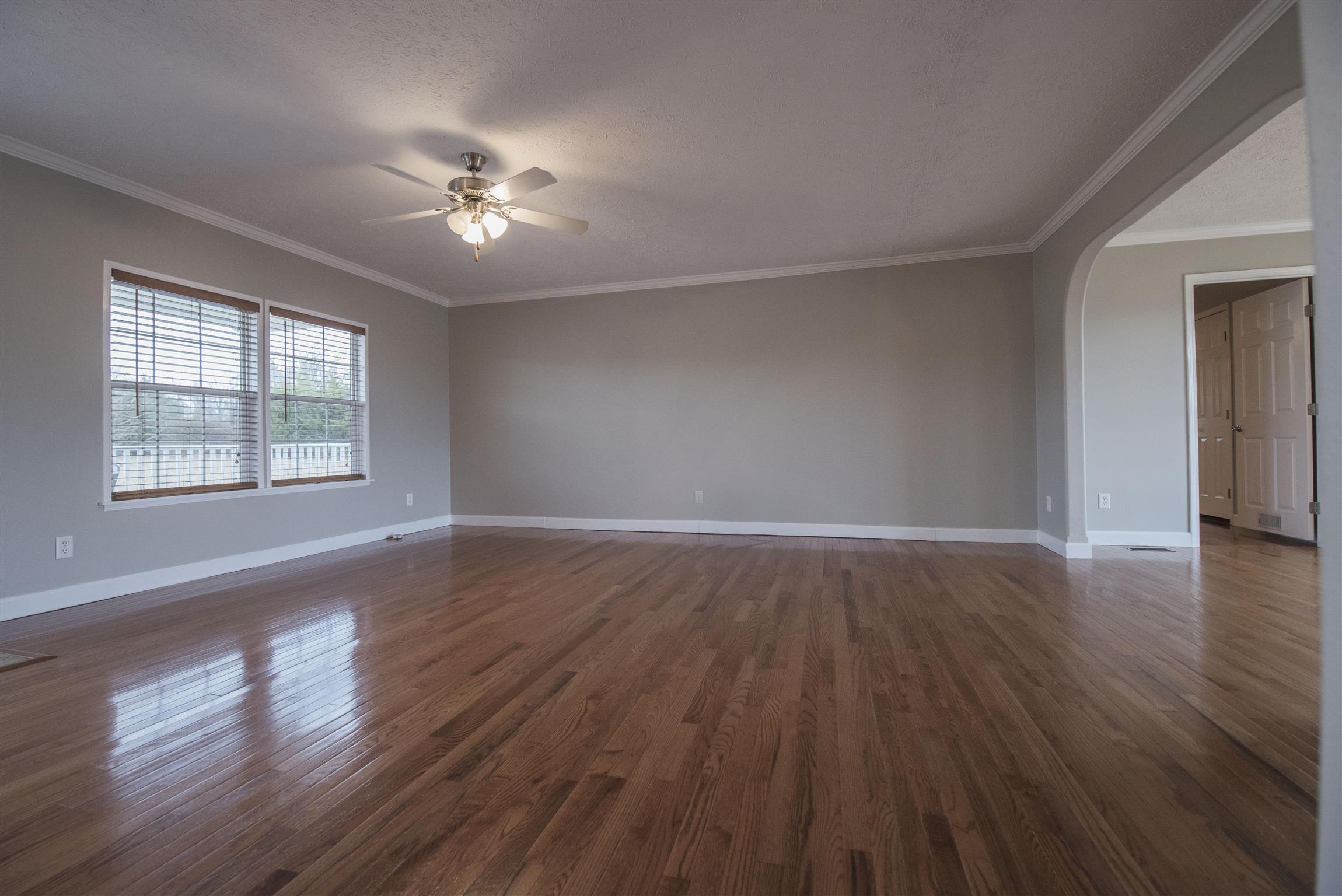 1227 Linwood Road Watertown, TN 37184 - Photo 14 of 29 a view of an empty room with wooden floor and a window