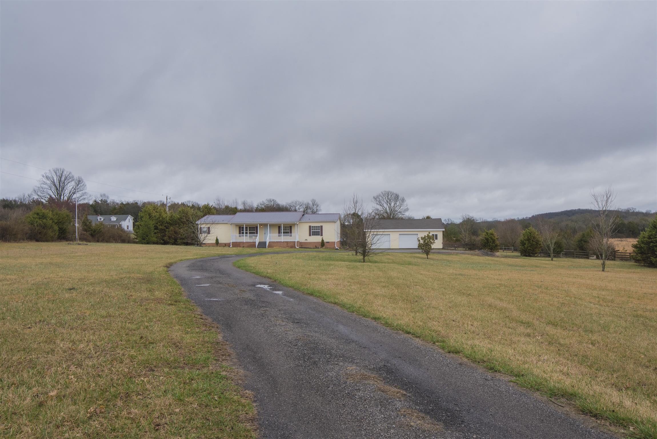 1227 Linwood Road Watertown, TN 37184 - Photo 5 of 29 a view of a big yard with palm trees