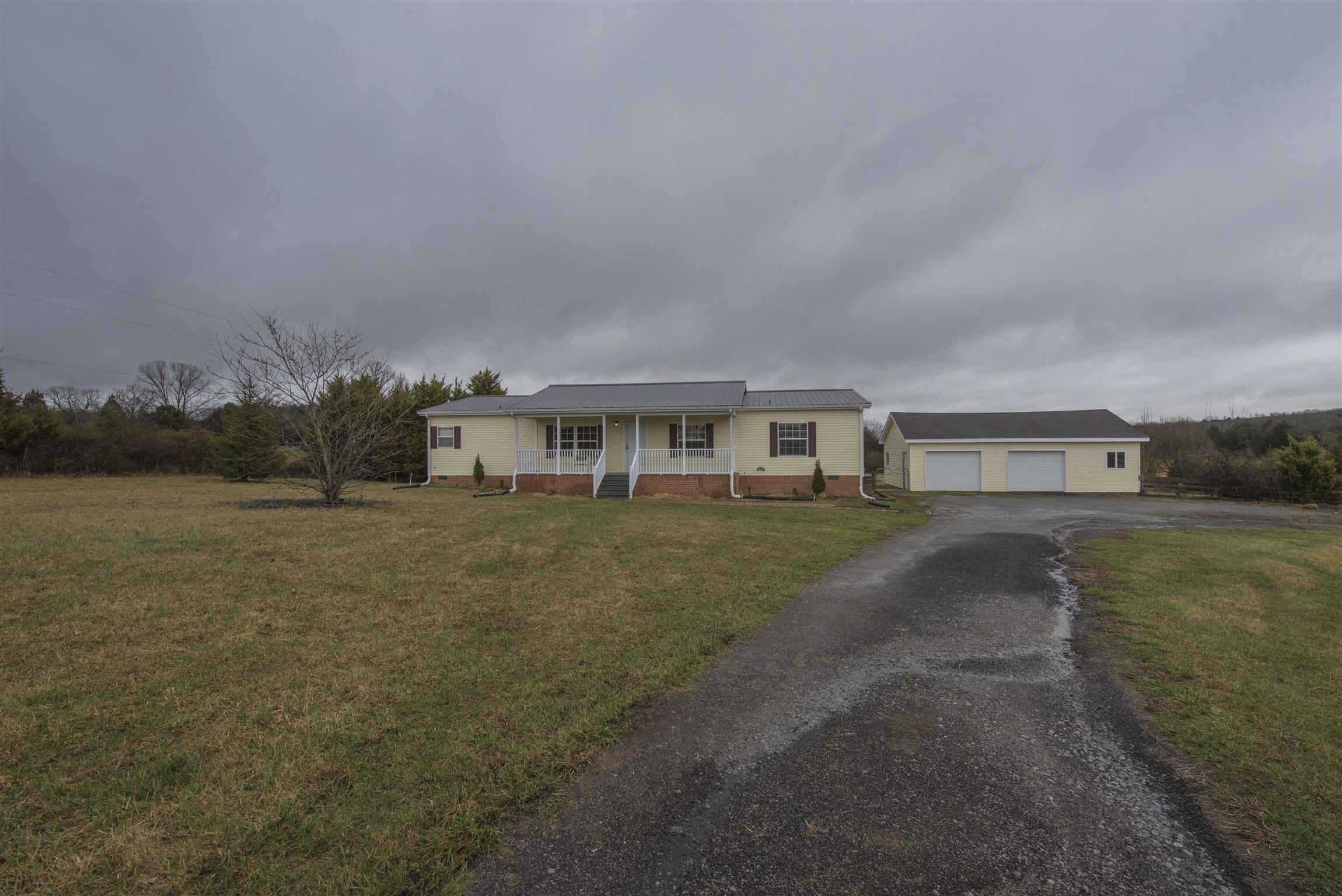 1227 Linwood Road Watertown, TN 37184 - Photo 6 of 29 a front view of a house with a yard