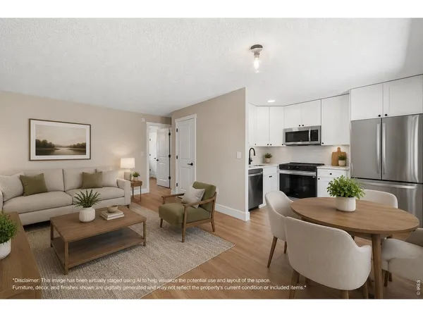 a living room with furniture a refrigerator and a dining table