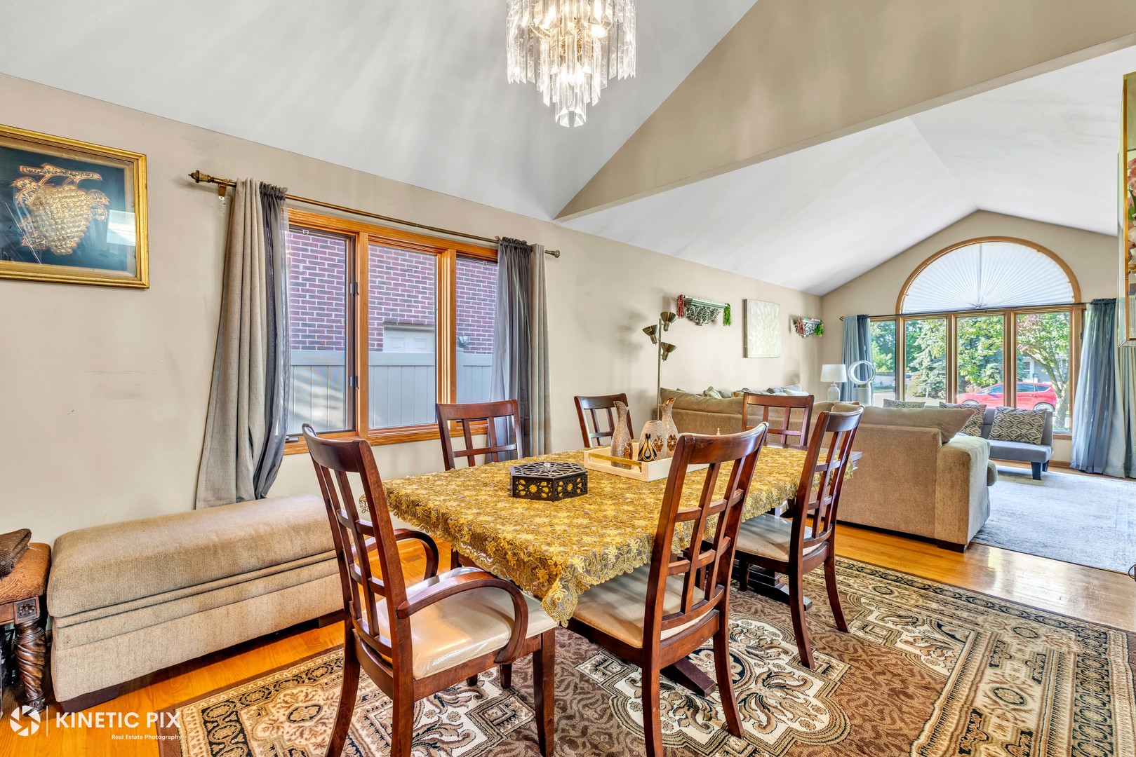 8619 Linder Avenue Burbank, IL 60459 - Photo 15 of 40 a dining room with furniture a chandelier and wooden floor