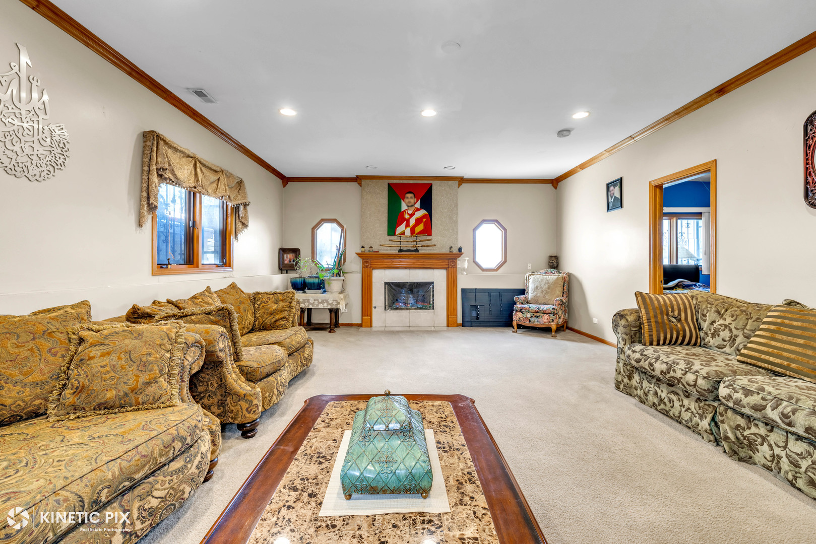 8619 Linder Avenue Burbank, IL 60459 - Photo 24 of 40 a living room with furniture and a fireplace