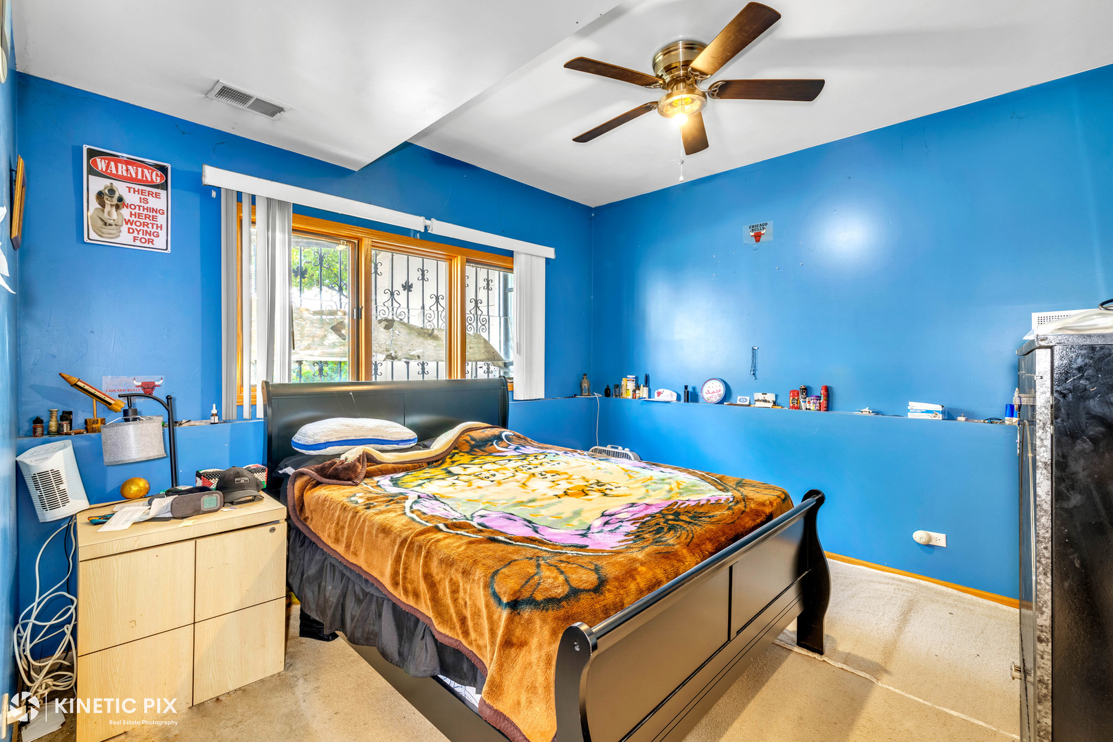 8619 Linder Avenue Burbank, IL 60459 - Photo 26 of 40 a bed sitting in a bedroom next to a window
